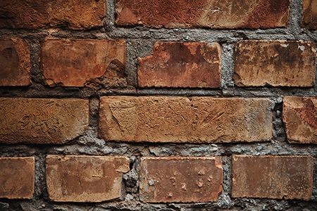 here are the pros & cons of covering brick with stucco