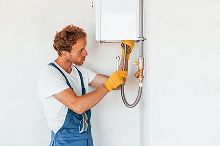 how long does it take plumbers to install a water heater?