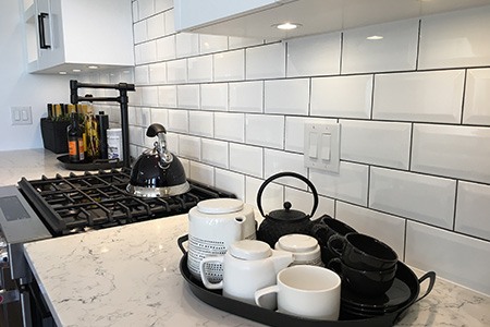 where to end backsplash? you must align with base cabinets & extend to the ceiling